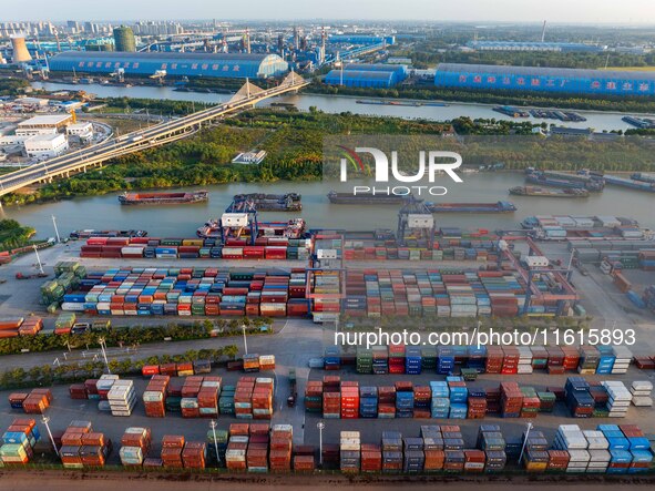 A photo taken on September 28, 2024, shows water transport along the Beijing-Hangzhou Grand Canal in Huai'an, Jiangsu province, China. 