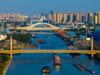 A photo taken on September 28, 2024, shows water transport along the Beijing-Hangzhou Grand Canal in Huai'an, Jiangsu province, China. (