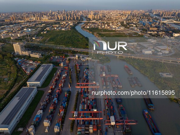 A photo taken on September 28, 2024, shows water transport along the Beijing-Hangzhou Grand Canal in Huai'an, Jiangsu province, China. 