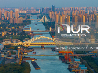 A photo taken on September 28, 2024, shows water transport along the Beijing-Hangzhou Grand Canal in Huai'an, Jiangsu province, China. (