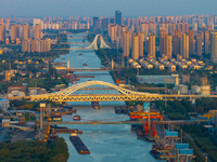 A photo taken on September 28, 2024, shows water transport along the Beijing-Hangzhou Grand Canal in Huai'an, Jiangsu province, China. (