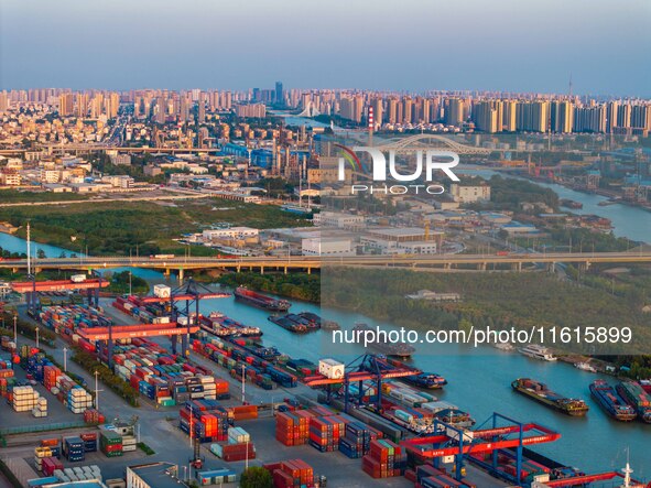 A photo taken on September 28, 2024, shows water transport along the Beijing-Hangzhou Grand Canal in Huai'an, Jiangsu province, China. 