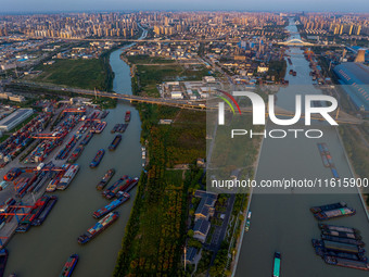 A photo taken on September 28, 2024, shows water transport along the Beijing-Hangzhou Grand Canal in Huai'an, Jiangsu province, China. (