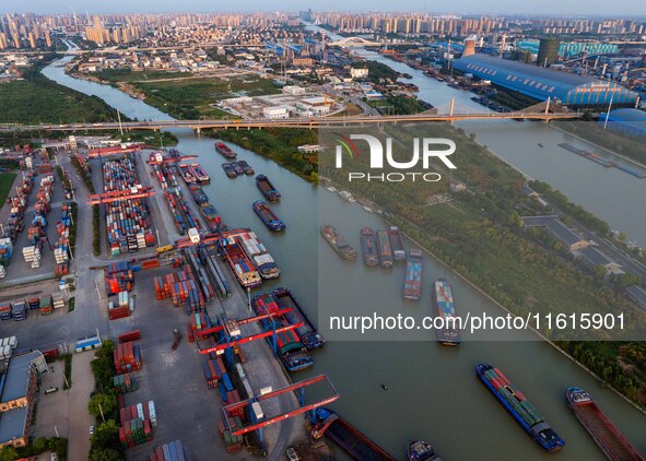 A photo taken on September 28, 2024, shows water transport along the Beijing-Hangzhou Grand Canal in Huai'an, Jiangsu province, China. 