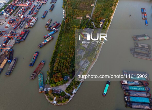 A photo taken on September 28, 2024, shows water transport along the Beijing-Hangzhou Grand Canal in Huai'an, Jiangsu province, China. 