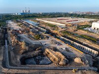 Workers work at the construction site of the third phase of the Canal New Port operation zone in Huai'an, China, on September 28, 2024. (