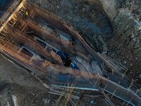 Workers work at the construction site of the third phase of the Canal New Port operation zone in Huai'an, China, on September 28, 2024. (