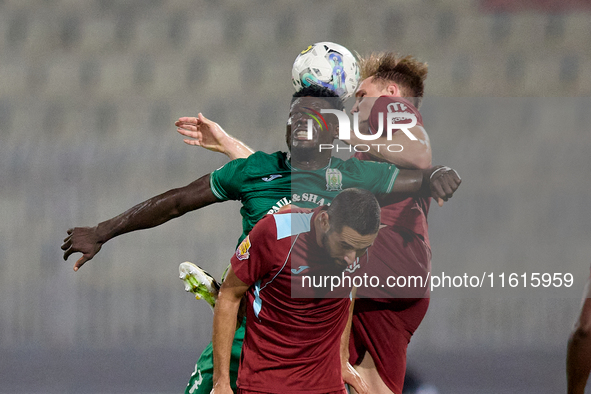 Franklin Sasere of Floriana vies for the ball with Gabriel Bohrer Mentz of Gzira United during the Malta 360 Sports Premier League soccer ma...