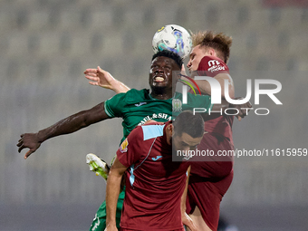 Franklin Sasere of Floriana vies for the ball with Gabriel Bohrer Mentz of Gzira United during the Malta 360 Sports Premier League soccer ma...