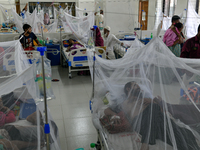 Patients receive medical treatment as they suffer from dengue at a hospital in Dhaka, Bangladesh, on September 28, 2024. (