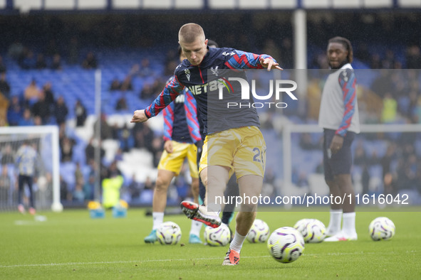 Adam Wharton #20 of Crystal Palace F.C. warms up during the Premier League match between Everton and Crystal Palace at Goodison Park in Live...