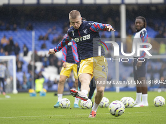 Adam Wharton #20 of Crystal Palace F.C. warms up during the Premier League match between Everton and Crystal Palace at Goodison Park in Live...