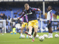 Adam Wharton #20 of Crystal Palace F.C. warms up during the Premier League match between Everton and Crystal Palace at Goodison Park in Live...