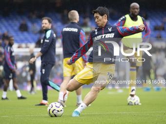 Daichi Kamada #18 of Crystal Palace F.C. warms up during the Premier League match between Everton and Crystal Palace at Goodison Park in Liv...