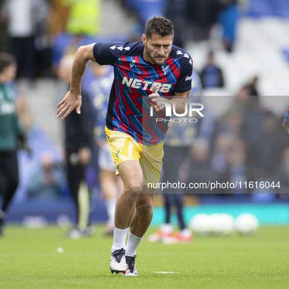 Joel Ward #2 of Crystal Palace F.C. warms up during the Premier League match between Everton and Crystal Palace at Goodison Park in Liverpoo...