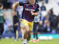 Joel Ward #2 of Crystal Palace F.C. warms up during the Premier League match between Everton and Crystal Palace at Goodison Park in Liverpoo...