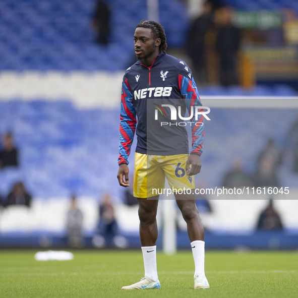 Asher Agbinone #64 of Crystal Palace F.C. warms up during the Premier League match between Everton and Crystal Palace at Goodison Park in Li...