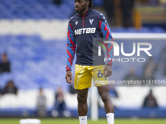 Asher Agbinone #64 of Crystal Palace F.C. warms up during the Premier League match between Everton and Crystal Palace at Goodison Park in Li...