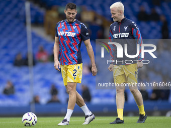 Joel Ward #2 of Crystal Palace F.C. and Will Hughes #19 of Crystal Palace F.C. during the Premier League match between Everton and Crystal P...