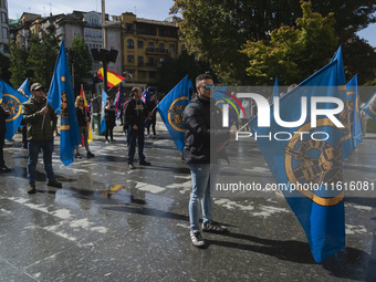 Many blue flags with the shield of the Alfonso I Association pose in front of the City Hall during the demonstration organized by the Associ...