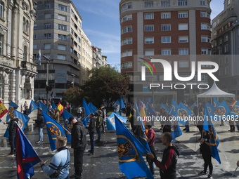 Many blue flags with the shield of the Alfonso I Association pose in front of the City Hall during the demonstration organized by the Associ...