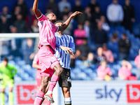 #17, Ousmane Diakite of WBA, and #44, Shea Charles of Sheffield Wednesday, battle in the air during the Sky Bet Championship match between S...