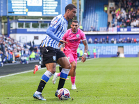 #27, Yan Valery of Sheffield Wednesday, in attacking action pressed by #18, Karlan Grant of WBA during the Sky Bet Championship match betwee...