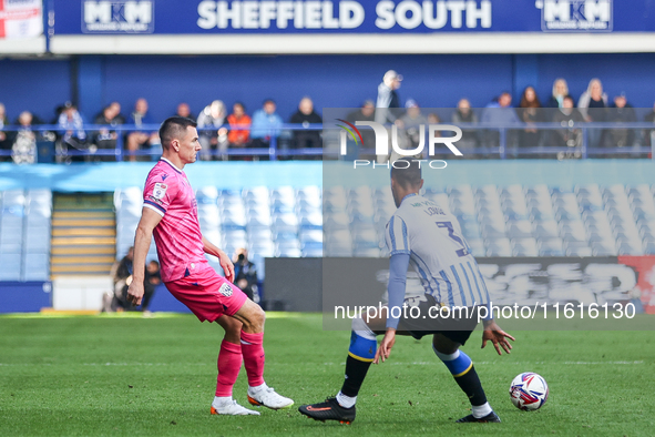 Jed Wallace of WBA passes to the center during the Sky Bet Championship match between Sheffield Wednesday and West Bromwich Albion at Hillsb...