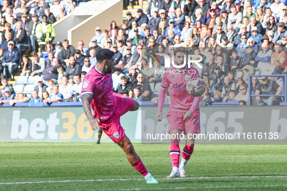 #27, Alex Mowatt of WBA lines up the volley which makes it 2-2, watched by #22, Mikey Johnston, during the Sky Bet Championship match betwee...