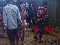 A person lives on the bank of the Nakhu River and is swept away and dies in the flood in Lalitpur, Nepal, on September 28, 2024. (