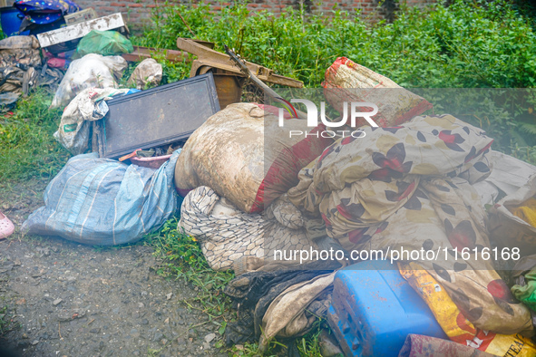 People's daily lives are affected due to heavy rainfall and flooding of the Nakhu River in Kathmandu, Nepal, on September 27, 2024. 