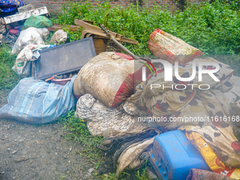 People's daily lives are affected due to heavy rainfall and flooding of the Nakhu River in Kathmandu, Nepal, on September 27, 2024. (