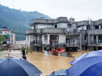 The rescue team rescues those trapped in the Nakhu River flood in Lalitpur, Nepal, on September 28, 2024. (