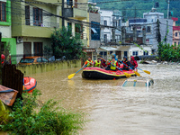 The rescue team rescues those trapped in the Nakhu River flood in Lalitpur, Nepal, on September 28, 2024. (