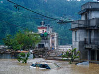 The rescue team of the Nepal Army rescues those trapped in the Nakhu River flood in Lalitpur, Nepal, on September 28, 2024, by helicopter. (