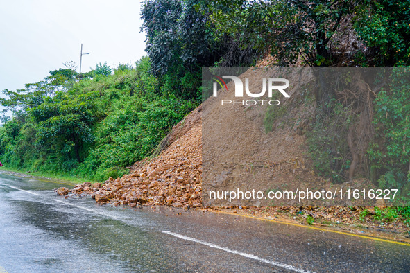 The Nakhu River floods and affects the riverbanks and homes during heavy rainfall in Kathmandu, Nepal, on September 28, 2024. 