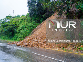 The Nakhu River floods and affects the riverbanks and homes during heavy rainfall in Kathmandu, Nepal, on September 28, 2024. (