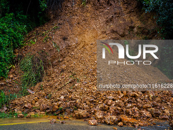 The Nakhu River floods and affects the riverbanks and homes during heavy rainfall in Kathmandu, Nepal, on September 28, 2024. (