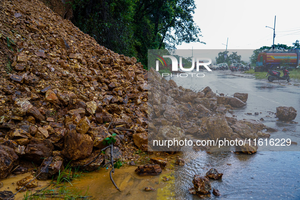 The Nakhu River floods and affects the riverbanks and homes during heavy rainfall in Kathmandu, Nepal, on September 28, 2024. 