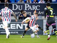 PSV Eindhoven defender Matteo Dams and Willem II forward Nick Doodeman during the match Willem II vs. PSV at the Koning Willem II stadium fo...