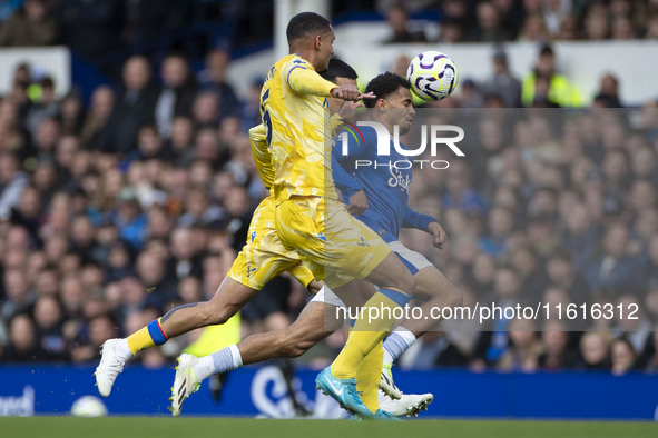 Iliman Ndiaye #10 of Everton F.C. is tackled by the opponent during the Premier League match between Everton and Crystal Palace at Goodison...