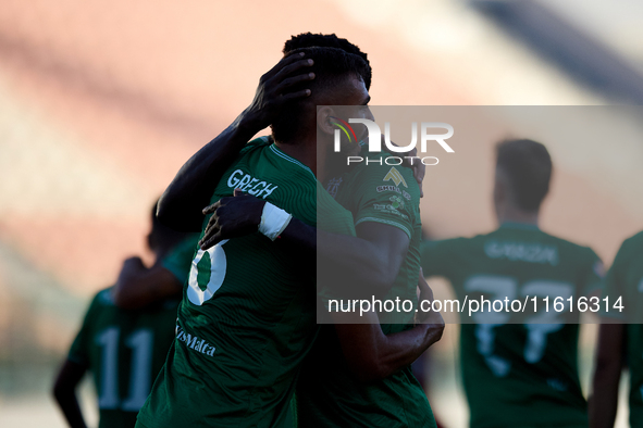 Jake Grech (L) of Floriana celebrates scoring the 1-0 goal with his teammates during the Malta 360 Sports Premier League soccer match betwee...