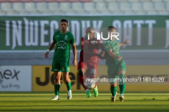 Alex Da Paixao Alves (L) of Gzira United competes for the ball with Carlo Zammit Lonardelli (R) of Floriana during the Malta 360 Sports Prem...