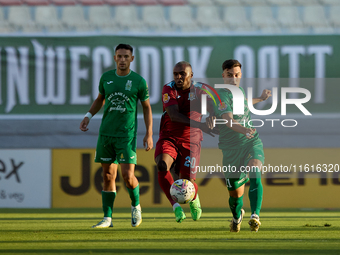 Alex Da Paixao Alves (L) of Gzira United competes for the ball with Carlo Zammit Lonardelli (R) of Floriana during the Malta 360 Sports Prem...