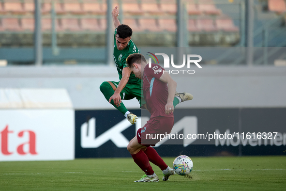 Carlo Zammit Lonardelli of Floriana is confronted by Gabriel Bohrer Mentz of Gzira United during the Malta 360 Sports Premier League soccer...