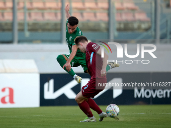 Carlo Zammit Lonardelli of Floriana is confronted by Gabriel Bohrer Mentz of Gzira United during the Malta 360 Sports Premier League soccer...