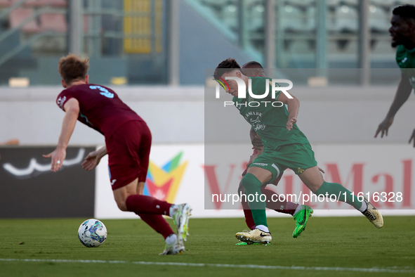 Carlo Zammit Lonardelli of Floriana is in action during the Malta 360 Sports Premier League soccer match between Floriana and Gzira United a...