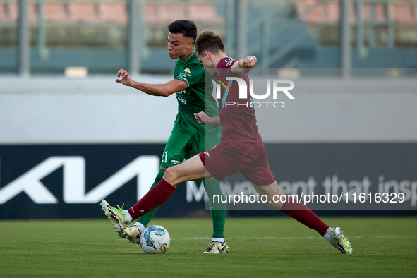 Carlo Zammit Lonardelli of Floriana is confronted by Gabriel Bohrer Mentz of Gzira United during the Malta 360 Sports Premier League soccer...