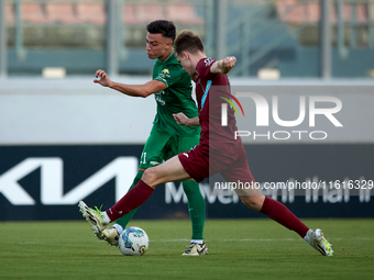 Carlo Zammit Lonardelli of Floriana is confronted by Gabriel Bohrer Mentz of Gzira United during the Malta 360 Sports Premier League soccer...