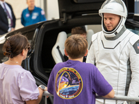 Nick Hague talks with his family minutes before heading to launch pad 40 at the Cape Canaveral Space Force Station. (